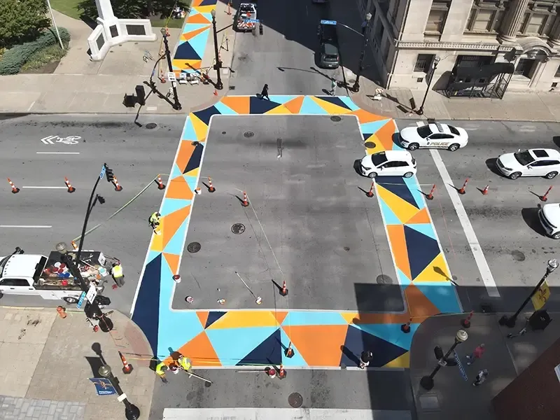 StreetBond installation: multicolored geometric crosswalk