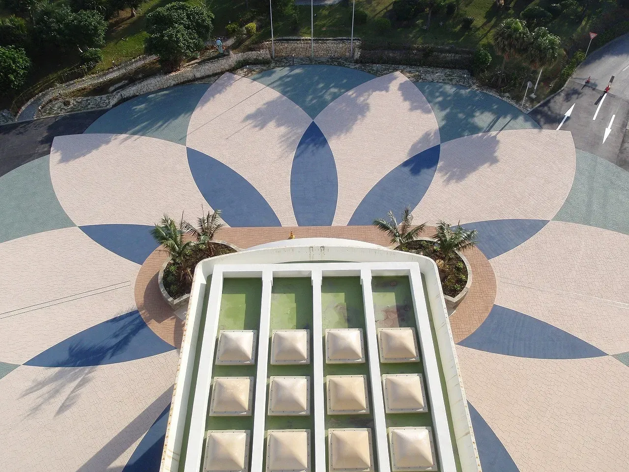 StreetBond installation: hotel entrance drive with a large decorative petal pattern